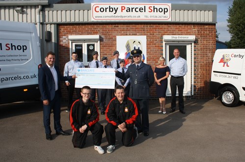 Corby Parcel Shop presenting cheque to Corby Air Cadets