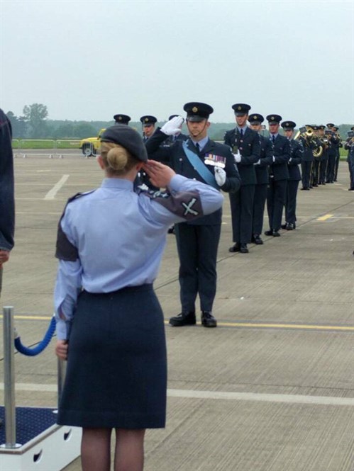 Sgt Kamila Bell returns the salute for the Station Commander