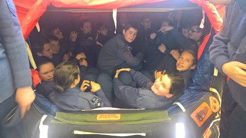 Corby Air Cadets try out a 20 man life raft